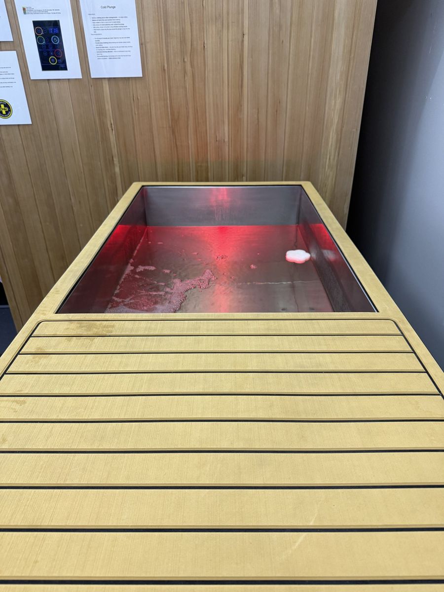 Cold plunge tank with wooden cover