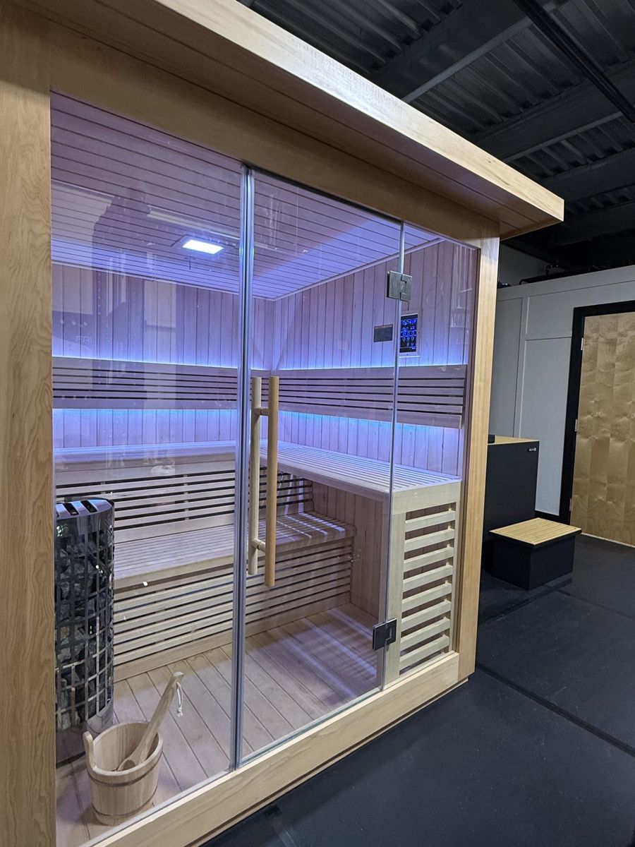 Glass-front sauna in the studio